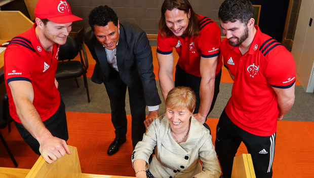 Arno Botha, Sammy Arnold, Doug Howlett and Tyler Bleyendaal, Munster Rugby with Vodafone enterprise director Regina Moran