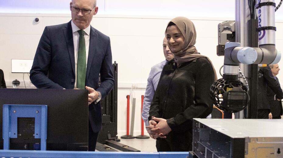 Minister Simon Coveney with Mark Dullea and Haleema Aziz