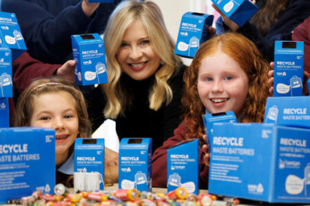 TV presenter Laura Woods with Millie O'Rourke and Evaine Healy of Roundwood National School in Wicklow