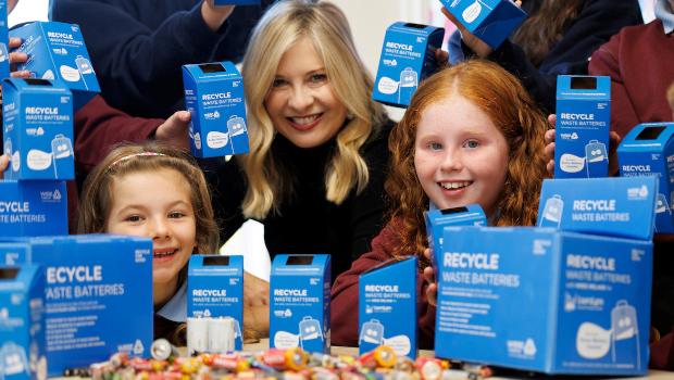 TV presenter Laura Woods with Millie O'Rourke and Evaine Healy of Roundwood National School in Wicklow